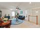 Upstairs living room with two sofas, a round area rug, and ample natural light at 1543 Ab Moore Jr Dr, Indian Trail, NC 28079