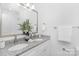 Elegant bathroom with double sinks, granite countertops, and brushed nickel fixtures at 1615 Martin Ave, Gastonia, NC 28052