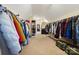 Massive walk-in closet with ample hanging and shelving space for all your storage needs at 16532 Flintrock Falls Ln, Charlotte, NC 28278