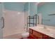 Bathroom featuring a tub, vanity, and tile surround at 16746 Amberside E Rd, Cornelius, NC 28031