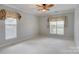 Bright bedroom with multiple windows that provide lots of natural light at 16746 Amberside E Rd, Cornelius, NC 28031