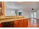 Kitchen featuring a breakfast bar, granite countertops, and stainless steel appliances at 16746 Amberside E Rd, Cornelius, NC 28031