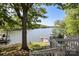 Breathtaking lake views and a private dock await you from this amazing property at 17333 Saranita Ln, Charlotte, NC 28278