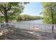 Relax on the deck and enjoy beautiful lake views with a private dock at 17333 Saranita Ln, Charlotte, NC 28278