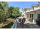 Enjoy outdoor dining and relaxing on this wooden rear deck at 17333 Saranita Ln, Charlotte, NC 28278