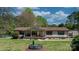 Charming one-story home with a welcoming front porch and a well-maintained yard at 2003 Cape Hickory Cutoff Rd, Hickory, NC 28601