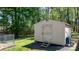 Backyard storage shed with double door and steps for accessing tools or equipment at 2003 Cape Hickory Cutoff Rd, Hickory, NC 28601