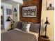 Bedroom showcasing exposed brick wall and urban-inspired decor at 201 S Hoskins Rd # 132, Charlotte, NC 28208