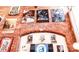 A brick wall adorned with music-themed artwork creates a vibrant atmosphere at 201 S Hoskins Rd # 132, Charlotte, NC 28208