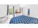 Bright bedroom with a TV, large windows, and a comfortable bed bathed in natural light at 2115 Sonoma Valley Dr, Charlotte, NC 28214