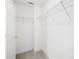 Walk-in closet with white walls and metal shelving for optimal storage solutions at 2115 Sonoma Valley Dr, Charlotte, NC 28214