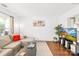 Bright living room featuring a comfortable sectional sofa, stylish decor, and a media center with a large TV at 2115 Sonoma Valley Dr, Charlotte, NC 28214