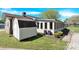 An open lawn with a shed and an attached room to the house at 2116 1St Avenue Nw Pl, Hickory, NC 28601