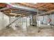 Spacious unfinished basement featuring concrete floors and exposed utilities at 2116 1St Avenue Nw Pl, Hickory, NC 28601