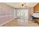 Cozy dining area with retro finishes, a sliding glass door, and a breakfast bar with seating at 2116 1St Avenue Nw Pl, Hickory, NC 28601
