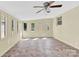 Bright sunroom with multiple windows, neutral walls, and decorative flooring, ideal for relaxation or entertainment at 2116 1St Avenue Nw Pl, Hickory, NC 28601
