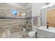 Beautifully designed bathroom featuring a glass-enclosed shower, modern fixtures, and neutral tiling at 220 Palm Cove Way, York, SC 29745