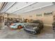 Bright, spacious three-car garage featuring various vehicles and ample storage at 220 Palm Cove Way, York, SC 29745