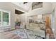 Spacious living room with hardwood floors leading to dining room and open kitchen area at 220 Palm Cove Way, York, SC 29745