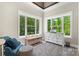 Bright sitting room with natural light and large windows with outdoor views at 220 Palm Cove Way, York, SC 29745