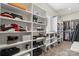 A large walk-in closet with custom shelving for storage at 220 Palm Cove Way, York, SC 29745