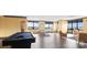 Spacious game room featuring a pool table, ping pong, and ample seating with city views at 222 S Caldwell St # 1801, Charlotte, NC 28202