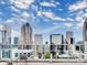 City skyline view from patio featuring modern building architecture on a sunny day at 222 S Caldwell St # 1801, Charlotte, NC 28202