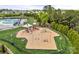 The community playground features swings, slides, climbing structures, and a cushioned surface for safety at 2262 Galloway Sw Ln, Concord, NC 28025