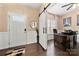 Bright home office with sliding barn door, hardwood floors, neutral walls, and great natural light at 2262 Galloway Sw Ln, Concord, NC 28025