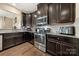 Updated kitchen with stainless steel appliances and granite countertops for a sleek, modern look at 2262 Galloway Sw Ln, Concord, NC 28025