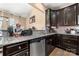 Bright kitchen with stainless steel dishwasher and granite counters offers form and function at 2262 Galloway Sw Ln, Concord, NC 28025