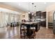 Open kitchen with a large island, pendant lighting, and adjacent dining area for modern living at 2262 Galloway Sw Ln, Concord, NC 28025