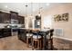 Stylish kitchen island with seating provides a casual dining spot and focal point in the space at 2262 Galloway Sw Ln, Concord, NC 28025