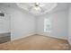 Spacious bedroom boasts tray ceiling, new carpet, and ample natural light at 2290 Kestrel Dr, Rock Hill, SC 29732