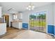 Eat-in kitchen featuring stainless appliances, ample counterspace, and view to fenced backyard at 2290 Kestrel Dr, Rock Hill, SC 29732