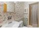 Bathroom with floral wallpaper, a toilet and shower at 2815 Burnt Mill Rd, Charlotte, NC 28210