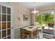 Bright breakfast nook with sliding glass doors to the outside and natural light at 2815 Burnt Mill Rd, Charlotte, NC 28210