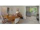Cozy dining room featuring a wooden table and a view into a separate living space at 2815 Burnt Mill Rd, Charlotte, NC 28210