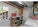Laundry room with washer, shelving and exterior access at 2815 Burnt Mill Rd, Charlotte, NC 28210