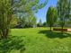 Expansive backyard featuring lush lawn space and storage shed, perfect for outdoor activities and relaxation at 3002 Fair Meadows Dr, Monroe, NC 28110