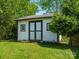 Outbuilding on lush lawn with mature trees at 3002 Fair Meadows Dr, Monroe, NC 28110