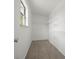 Bright walk-in closet with carpet, shelving, and natural light from the window at 3002 Fair Meadows Dr, Monroe, NC 28110
