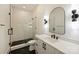 Modern bathroom with glass-enclosed shower, marble floor and a sleek vanity at 3473 Willow Oak Rd, Charlotte, NC 28209