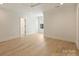 Bright bedroom with hardwood floors and a ceiling fan at 3473 Willow Oak Rd, Charlotte, NC 28209
