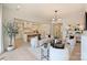 Open concept living room with a kitchen view, fireplace, and stylish modern decor at 3473 Willow Oak Rd, Charlotte, NC 28209