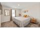 Bedroom showcasing a window, plush carpet, and neutral decor at 3637 Allenby Pl, Monroe, NC 28110