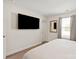 Bedroom featuring a large television, window, and carpeted floor at 3637 Allenby Pl, Monroe, NC 28110