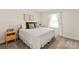 Bright bedroom featuring neutral walls, carpet flooring, and a light-filled window at 3637 Allenby Pl, Monroe, NC 28110