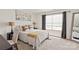 Bedroom with carpeted flooring, side tables and a large window at 3637 Allenby Pl, Monroe, NC 28110