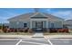 Charming clubhouse featuring a gated entrance, stone accents, and well-maintained landscaping at 3637 Allenby Pl, Monroe, NC 28110